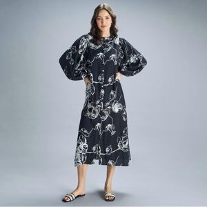 Splash resort wear black and white midi dress with puffed sleeves.Size 14